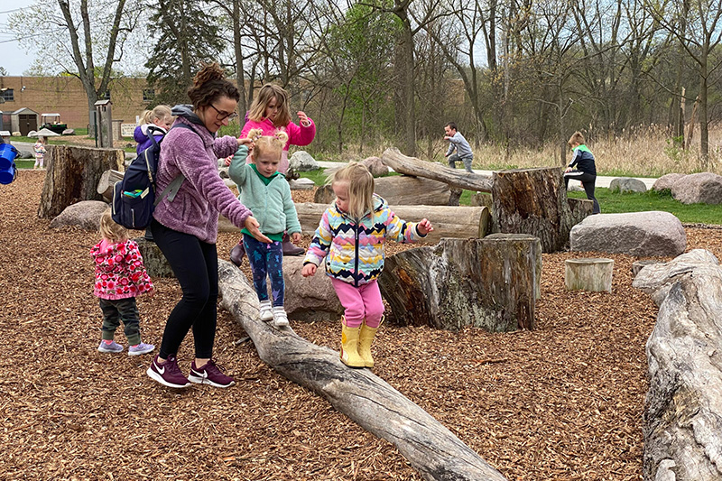 Mother and their children at Earth Day play date