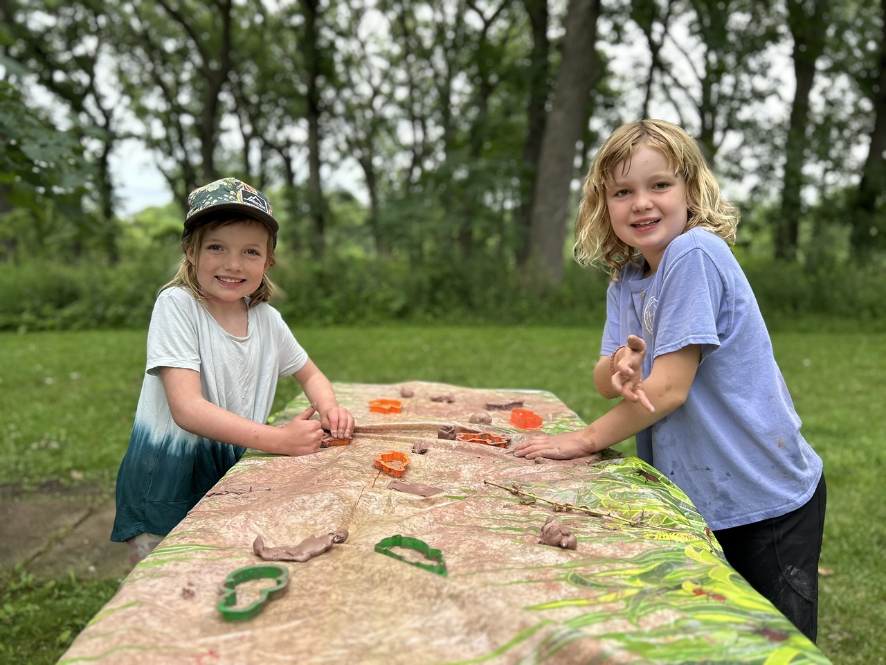 two girls play at Lincoln Marsh